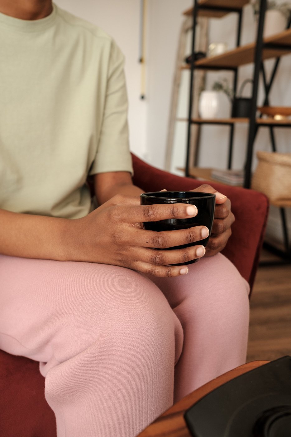 Female Client with Cup of Coffee during Therapy Session